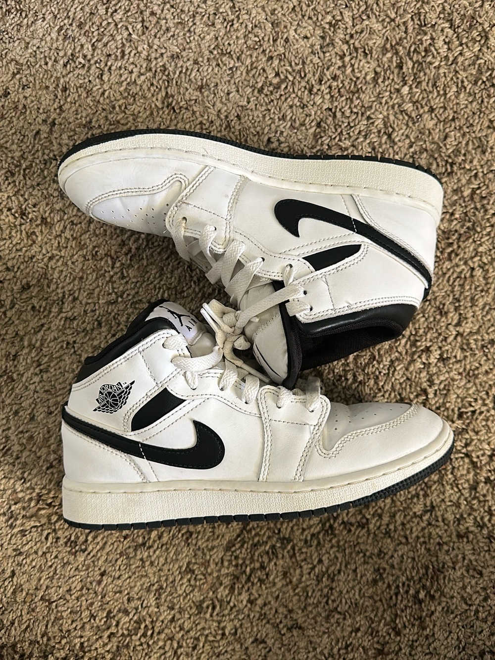 Nike White and Black Mid-Top Sneakers